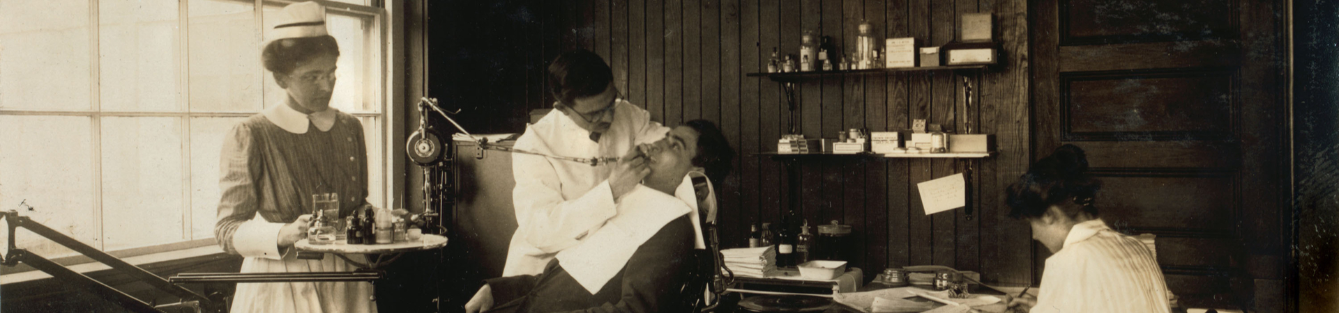 old black and white photo of a dentist's office