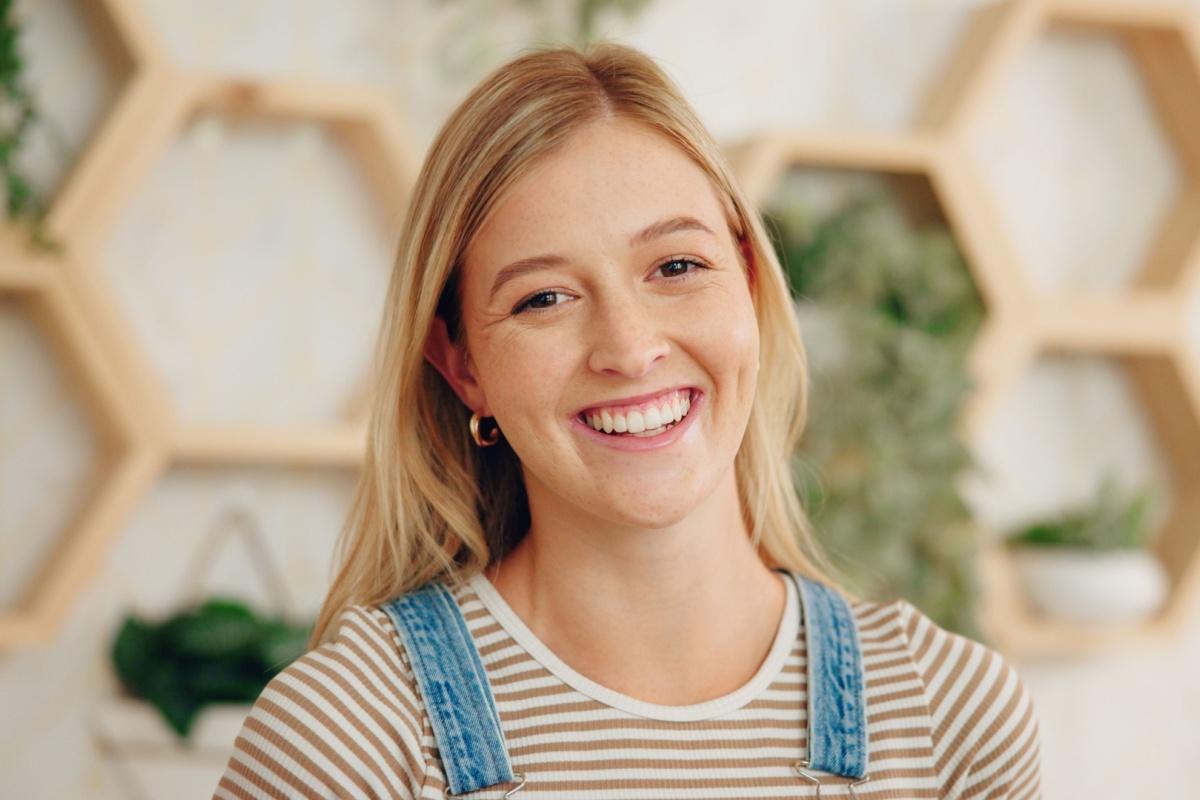 a person smiling with perfect teeth